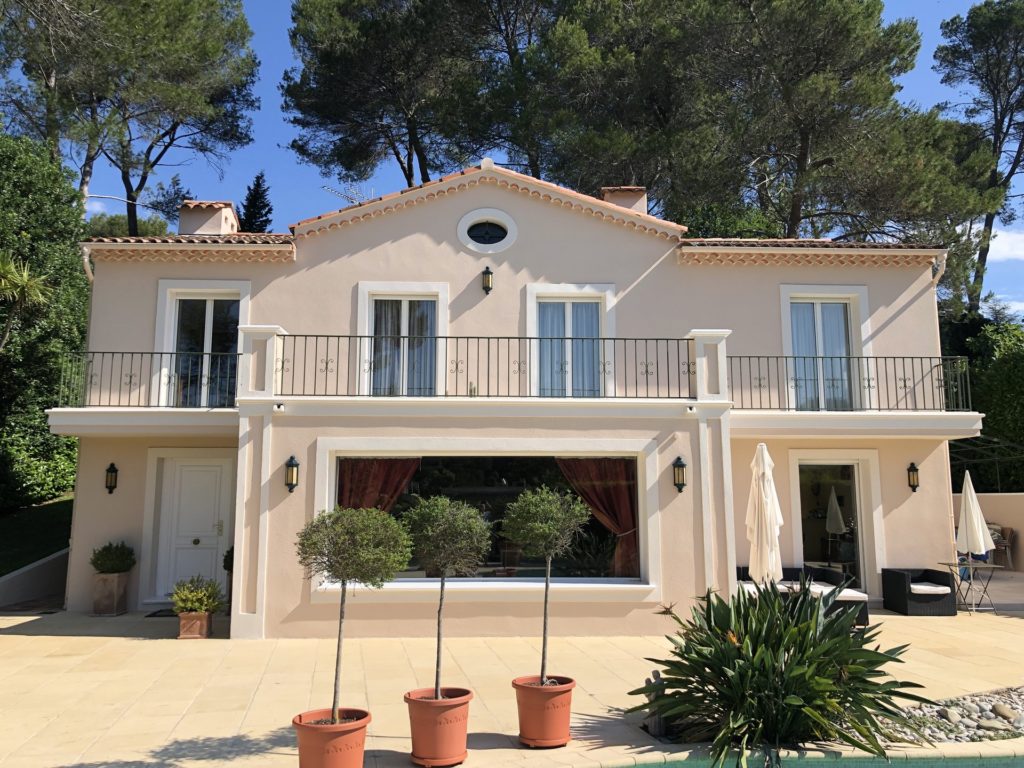 two floor light salmon colored house for sale in mougins with private pool