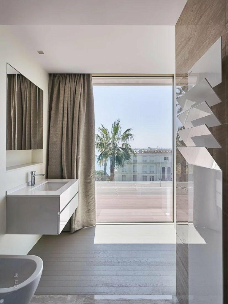 modern bathroom with large view at luxury villa cannes californie