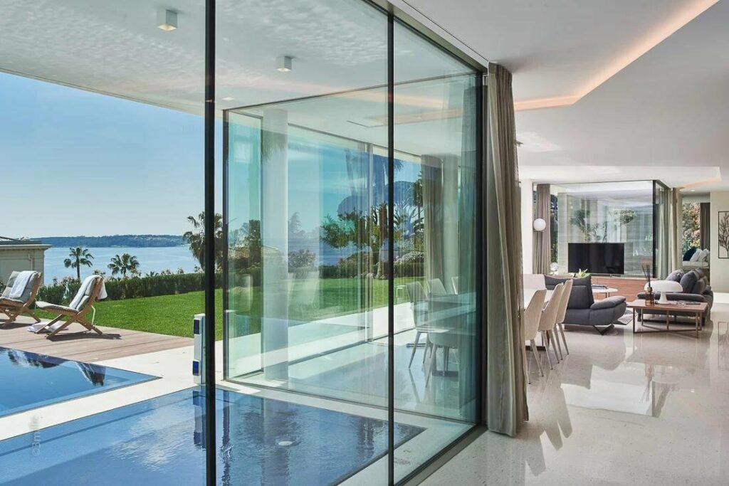 large windows next to terrace of luxury villa in cannes californie