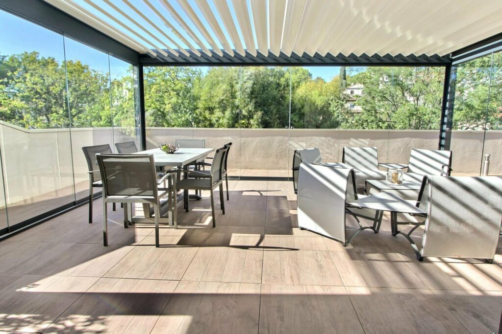 terrace with white outdoor furniture