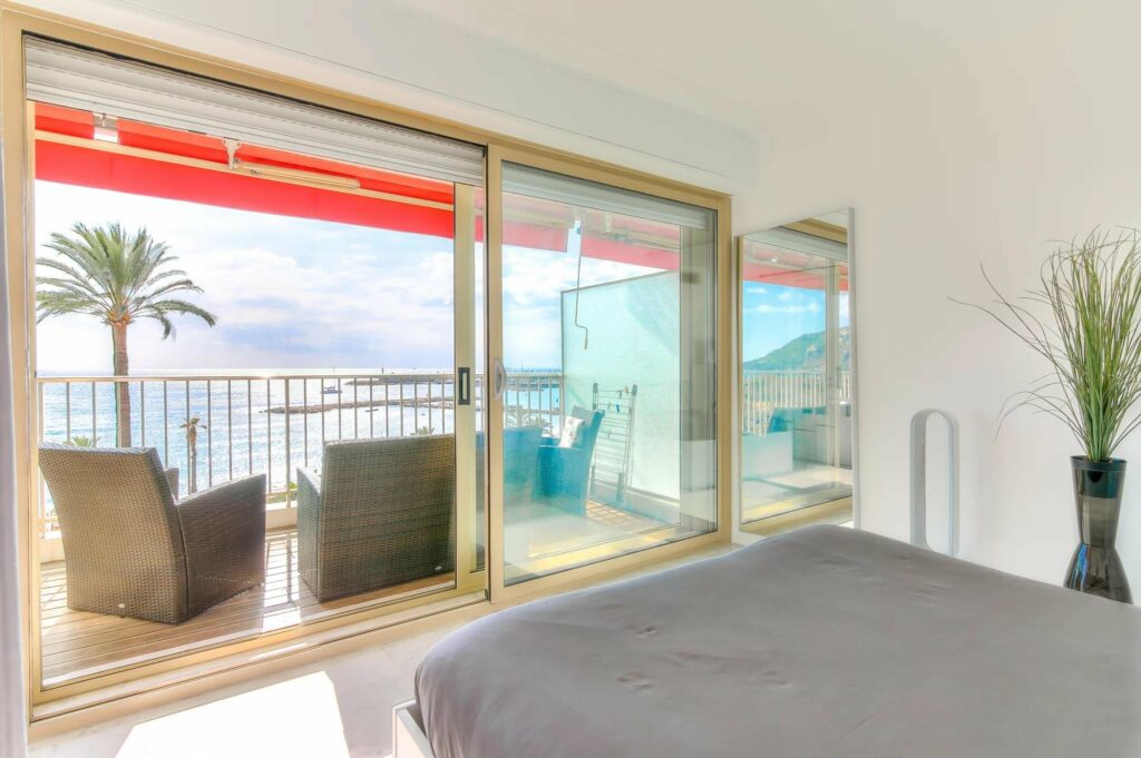bedroom with large terrace with sea view