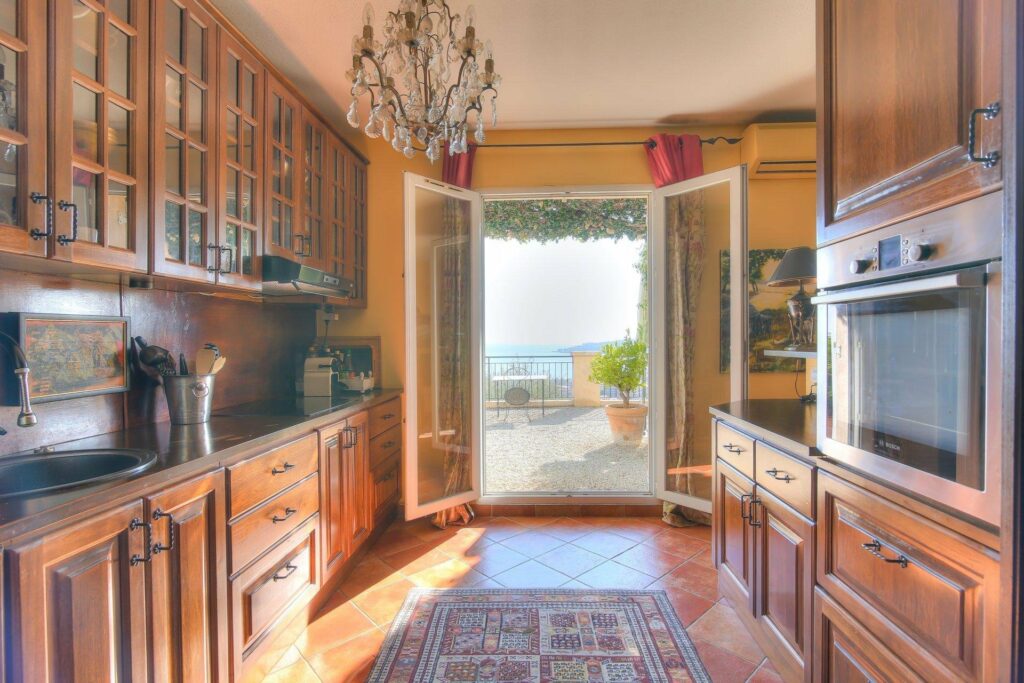 kitchen with charming design and warm wood cabinets and beautiful view