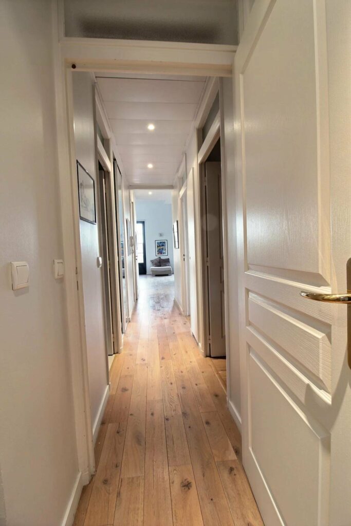 hallway with wooden floors and modern design