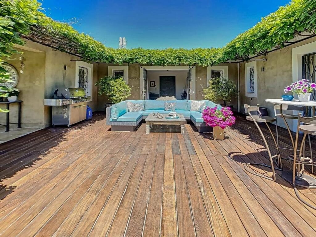 deck of villa for sale in mougins with swimming pool