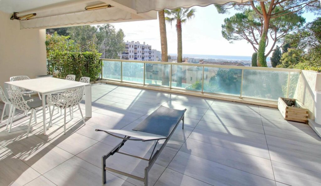 terrace with view of cannes with glass railing