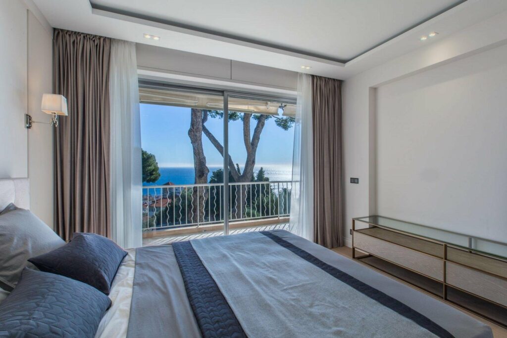 bedroom with terrace and sea view in south of france apartment