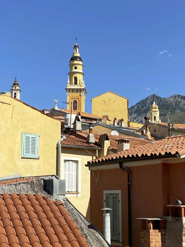 view of old town of menton with church