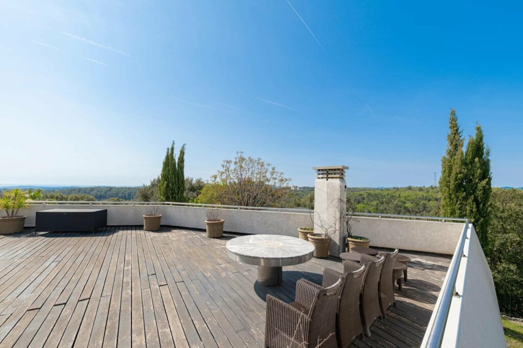 rooftop deck with view of surrounding hills and mountains of valbonne house