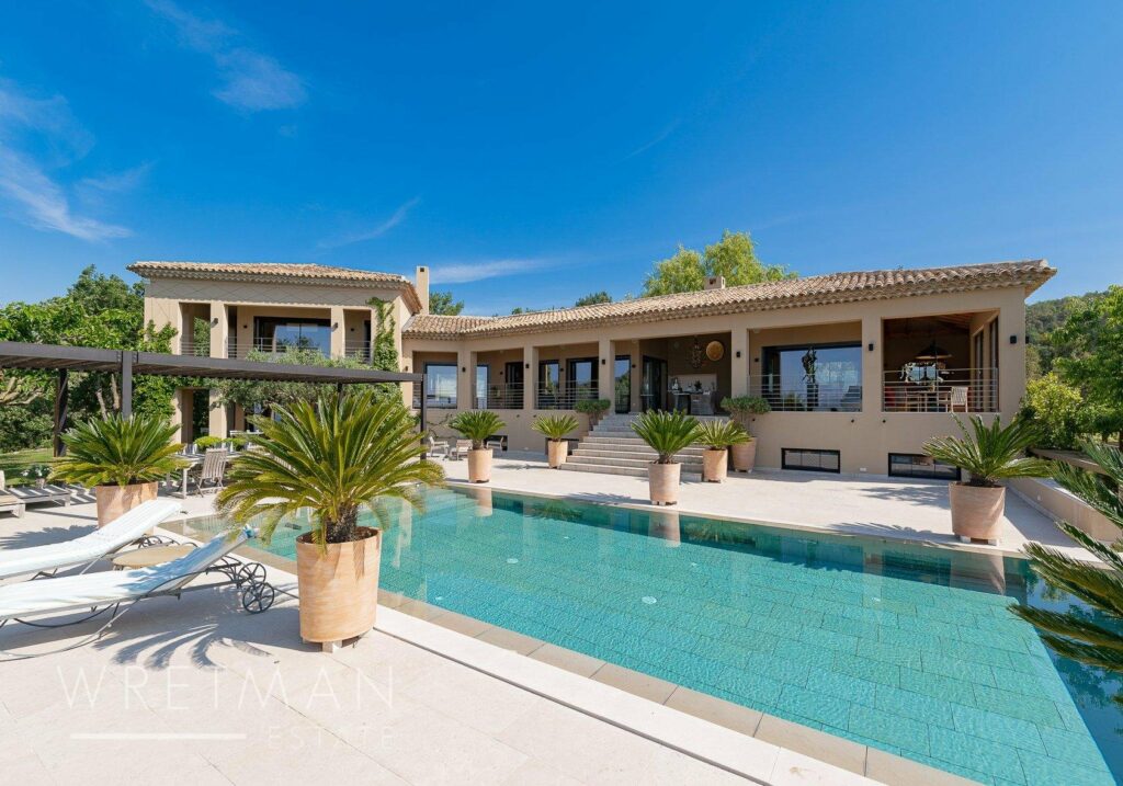 backyard of modern villa with large swimming pool