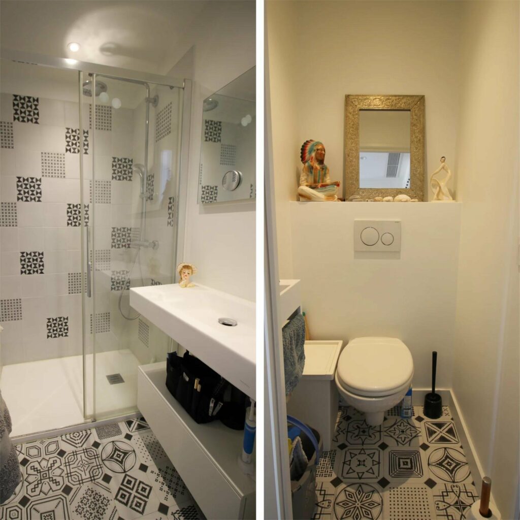 bathroom with black and white printed tile and standing shower