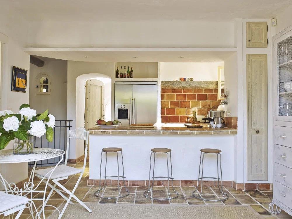 kitchen with stone floors and charming provencal design