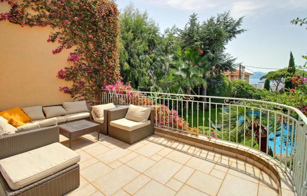 terrace with view over the hills of cannes with outdoor furniture