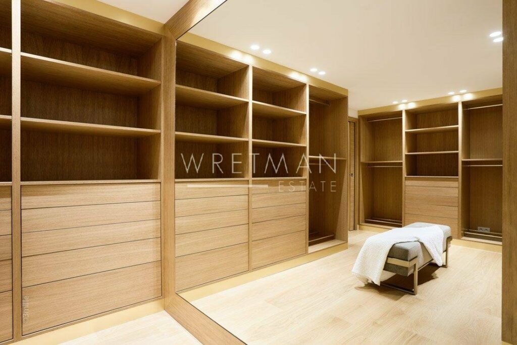 large open walk in closet in luxury apartment in cannes