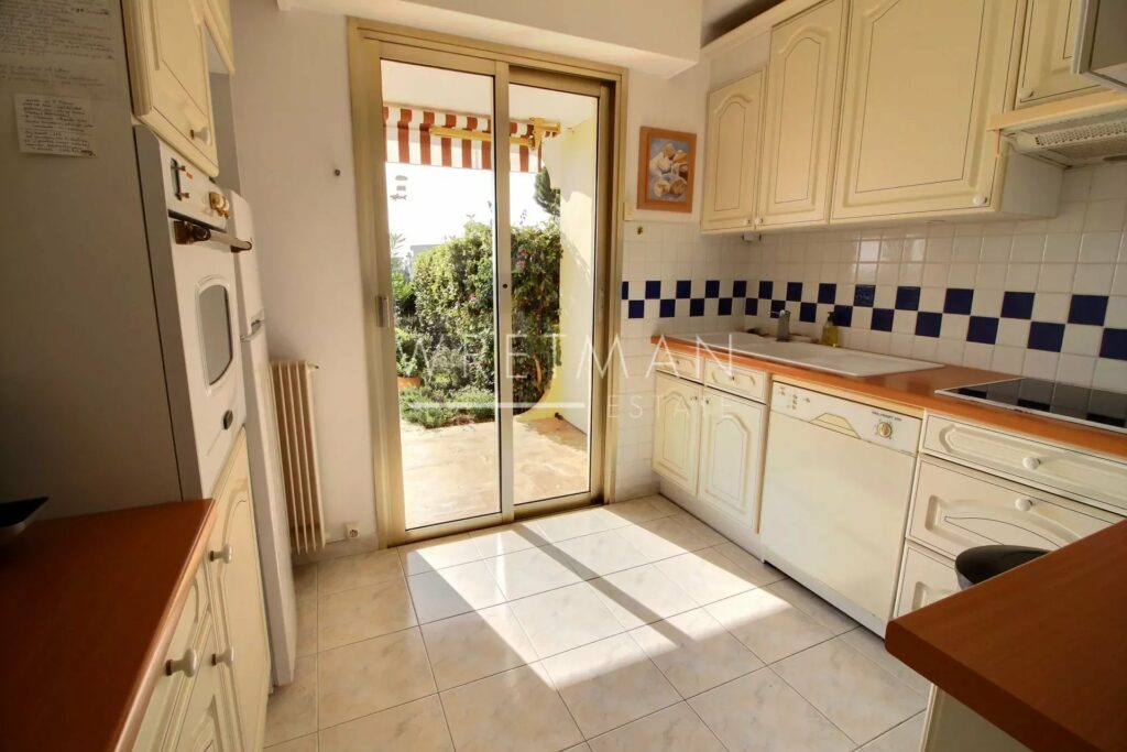 kitchen with sliding glass door access to garden